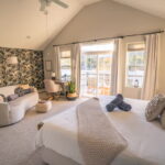 Primary bedroom with deck & lake/mountain view-2 Primary bedroom with deck & lake/mountain view-2