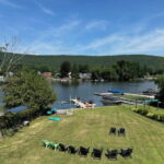 Aerial view of back yard, lake, mountains Aerial view of back yard, lake, mountains