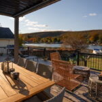 View of lake & mountains from back deck dining table View of lake & mountains from back deck dining table